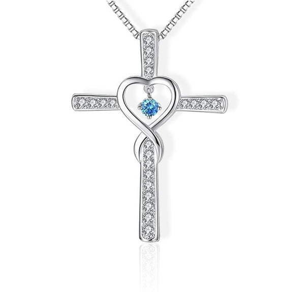 cross necklace with heart in the middle blue