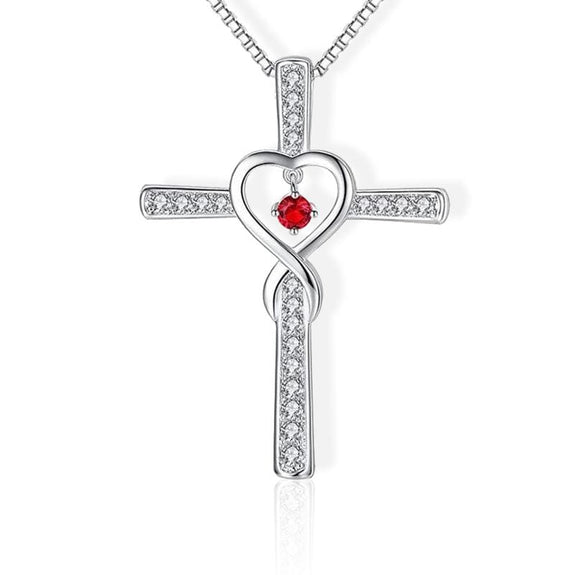 cross necklace with heart in the middle red