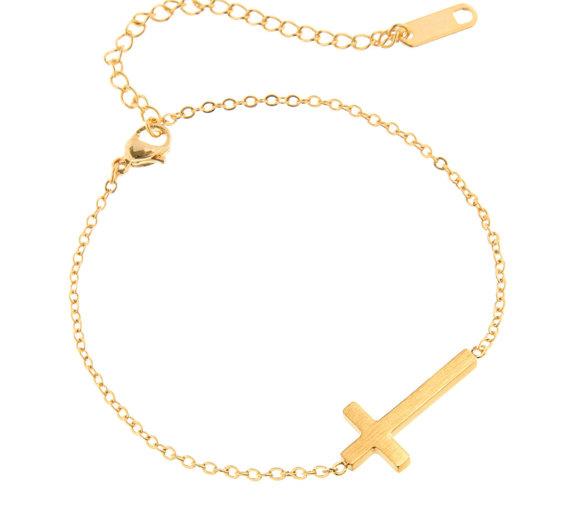 sideways cross bracelet gold